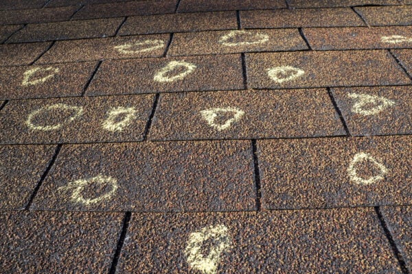 Roof Insurance Claim Adjuster's Inspection Markings on a Damaged Roof