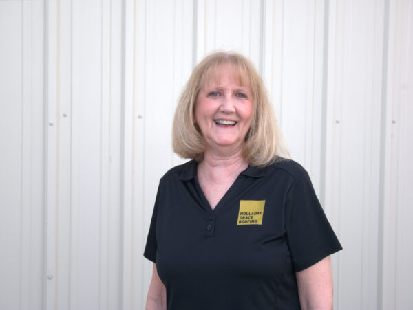 Customer Service is another good way to compare roofing contractors. Here's a photo of Holladay Grace's smiling Customer Service Specialist, Wendy.